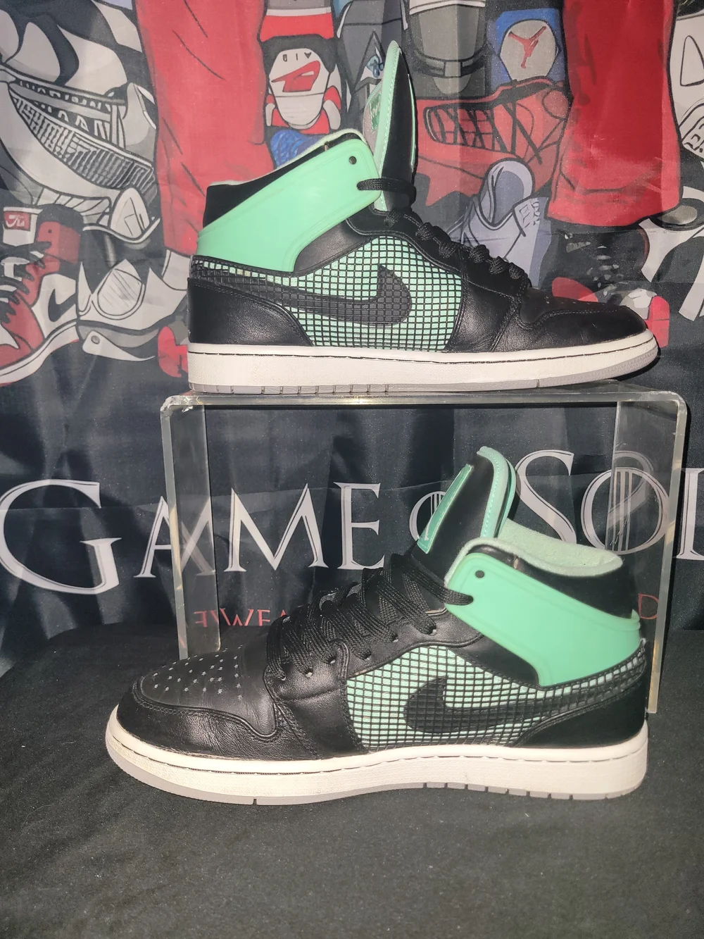 Jordan 1 Retro Black and Mint Green Glow Hi-Top Sneakers